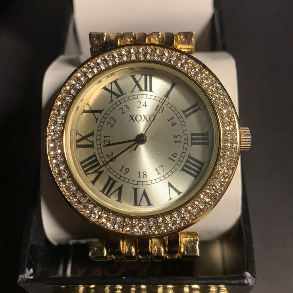 3/$27 XOXO women’s goldtone watch in original box